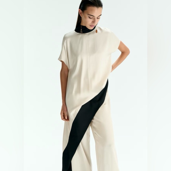 H&M Pants - H&M  Cream & Black Asymmetrical Top size small NWT